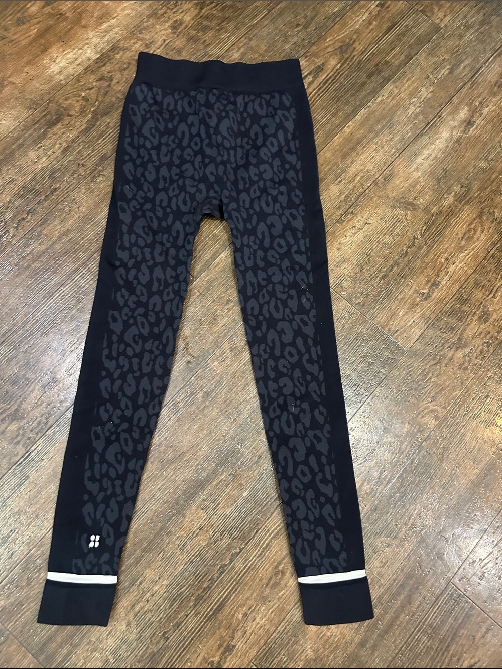 Sweaty Betty Black Leopard Print Leggings with Reflective Hem Stripe - Picture 3 of 4